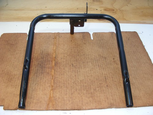 Escavatore raccoglierba